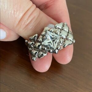 Liquid Metal silver plate flexible mesh band ring with swarovski crystal.